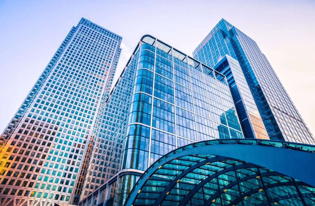 Modern glass skyscrapers viewed from below in financial district