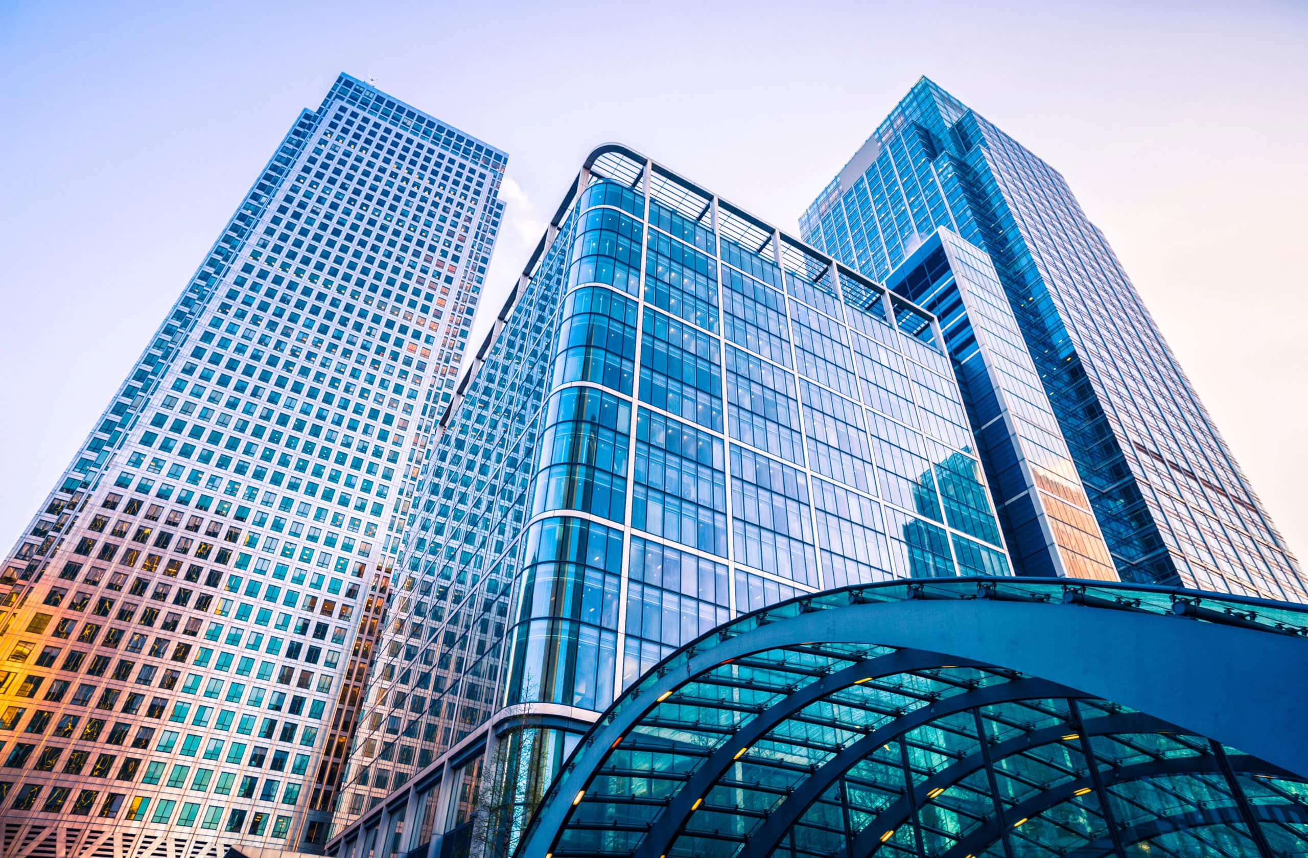 Modern glass skyscrapers viewed from below in financial district